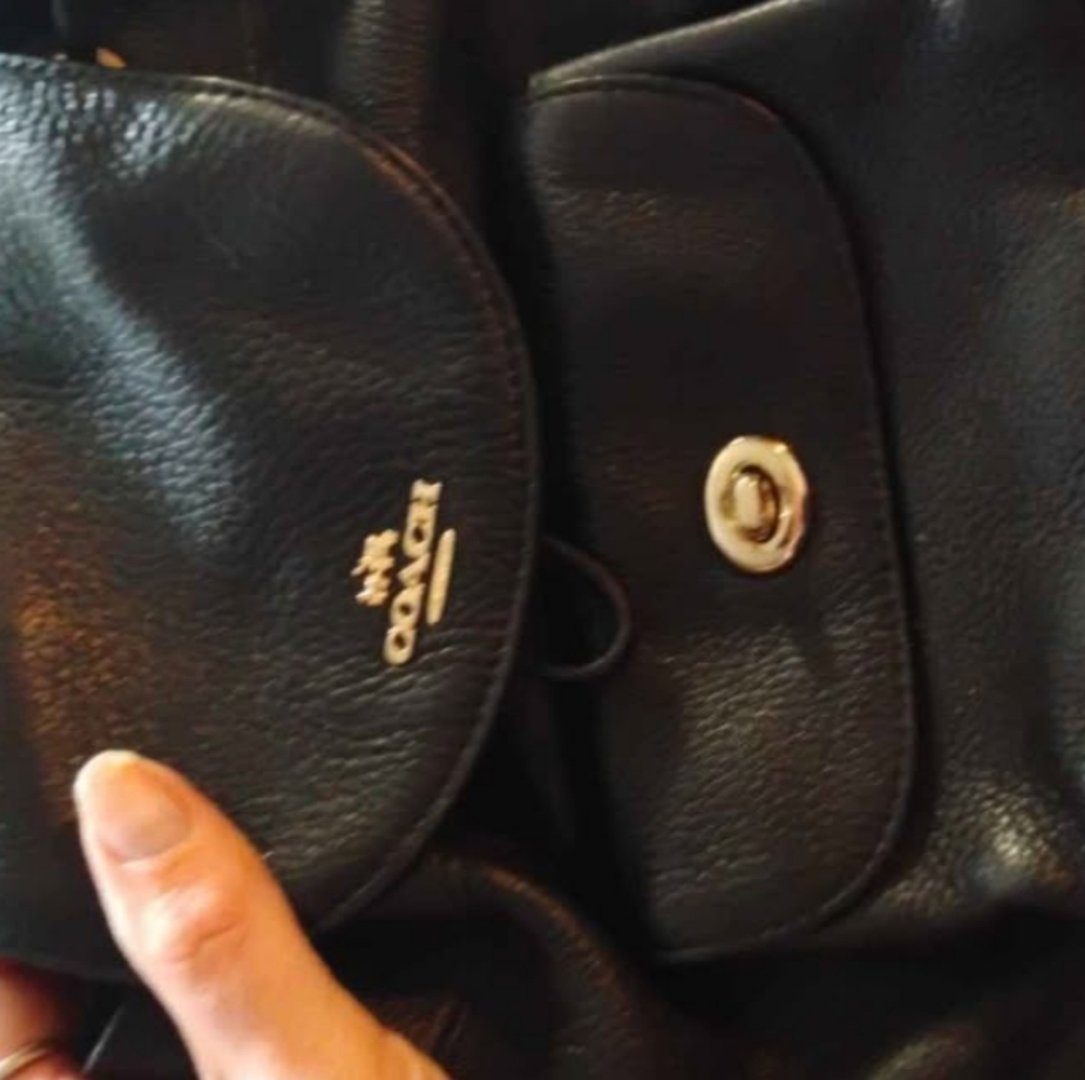 Coach Black Leather Backpack with Structured Design